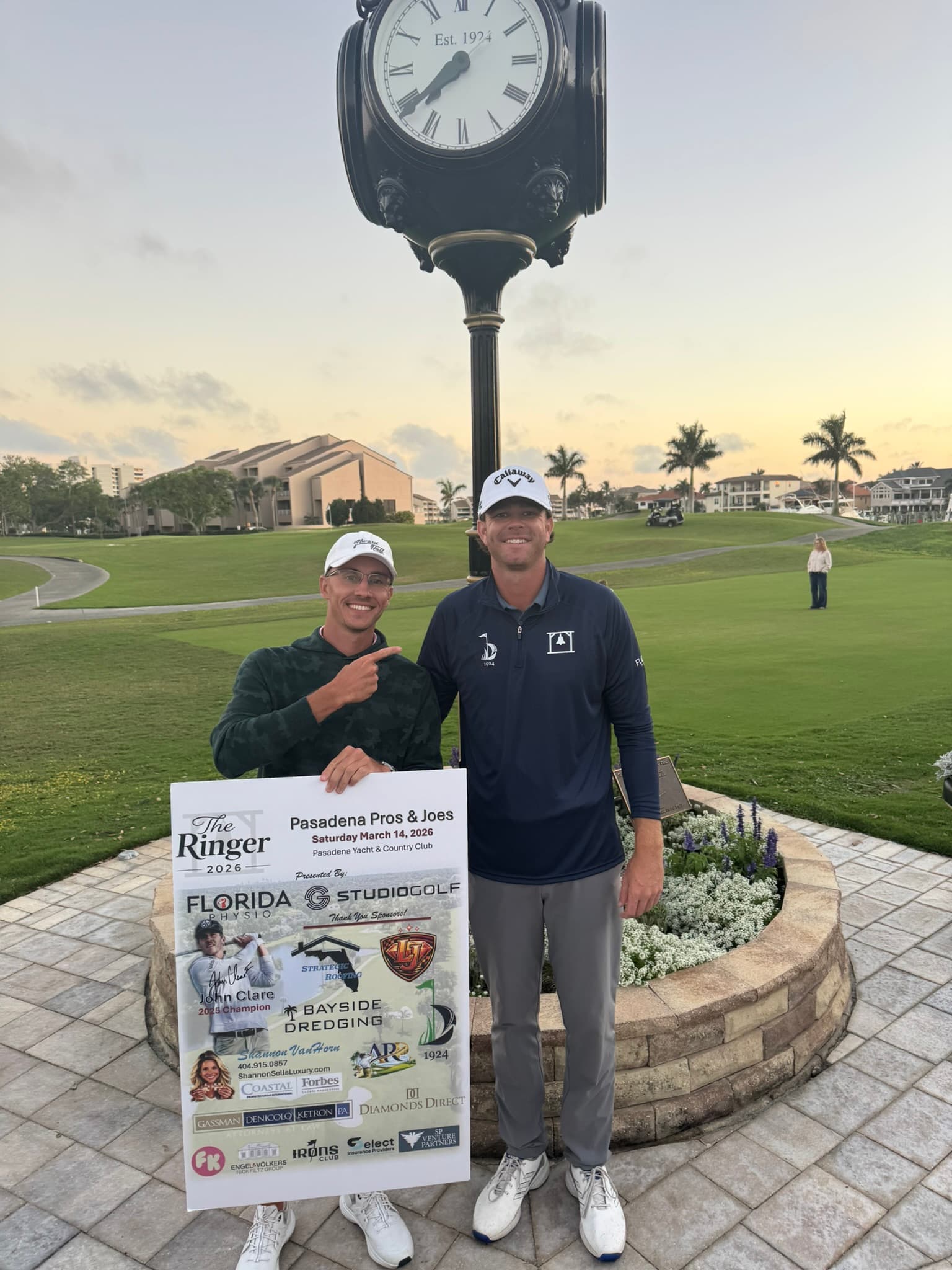 John Clare handing the title to Marcus Plunkett